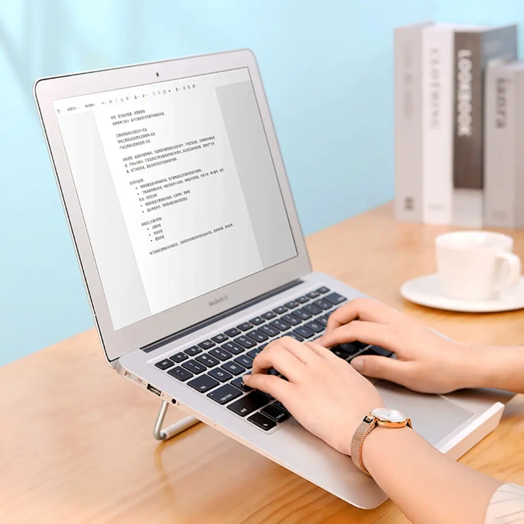 ugreen_adjustable_silver_laptop-stand_typing_alt1.webp